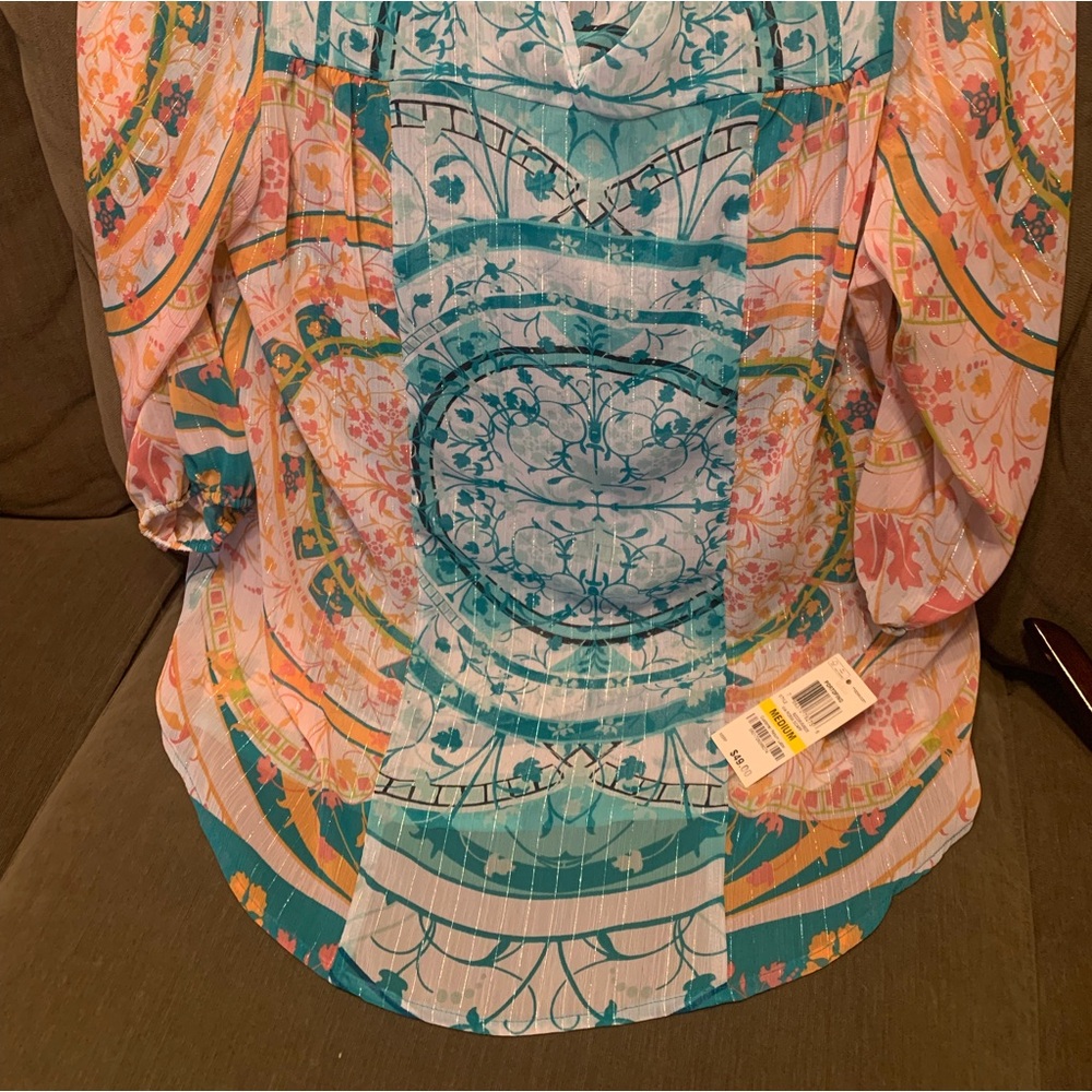 A very colorful lite summer top. N WT. 3/4 sleeve
